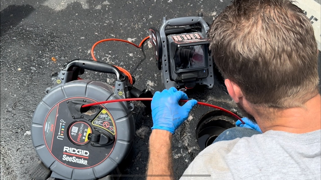 Sewer camera inspection being performed on a Fresno home drain line